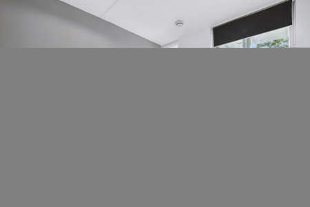 Designed in a minimalistic style bedroom interiorの写真素材