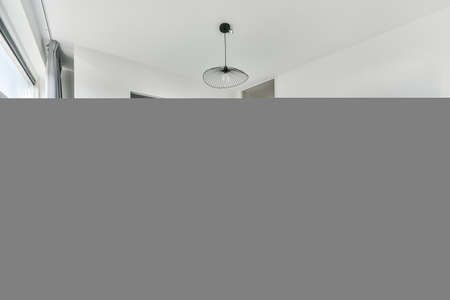 Designed in a minimalistic style bedroom interiorの写真素材