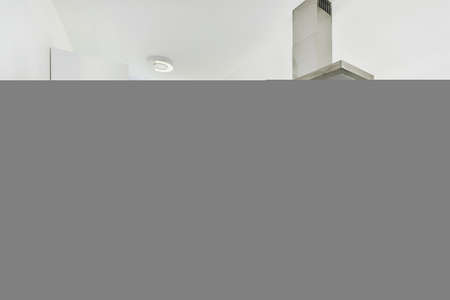 A bright kitchen in an elegant houseの写真素材