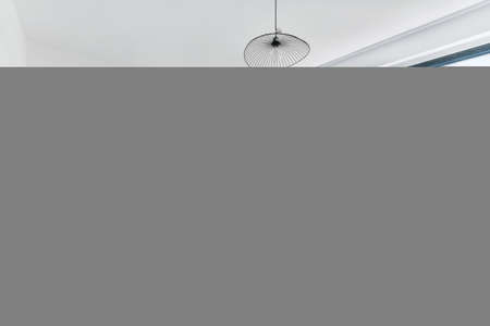 Designed in a minimalistic style bedroom interiorの写真素材