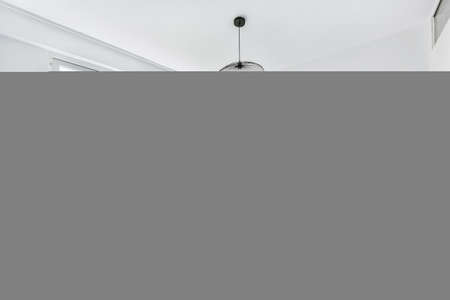 Designed in a minimalistic style bedroom interiorの写真素材