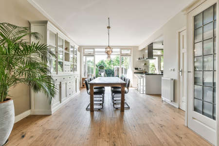 Stylish dining room with decorative table and chairs
