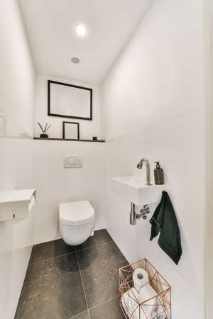 Interior of small clean toilet in miniature styleの写真素材