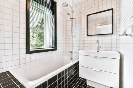 Beautiful bathroom with a big bathtub and white walls