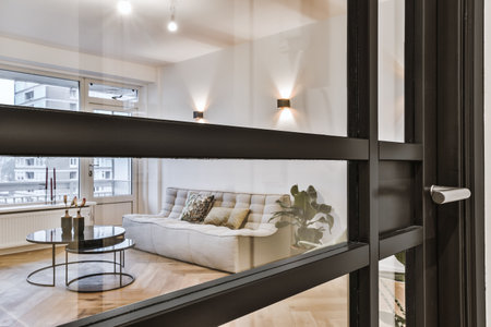 Black glass door leading to the living room