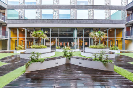 Inner courtyard of the building with gas and fountainの写真素材