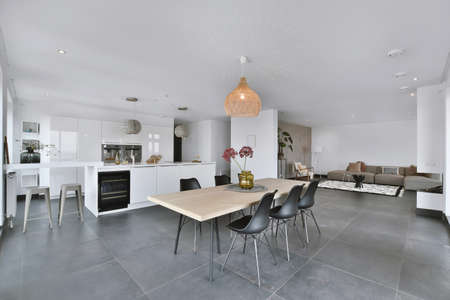 Bright dining room with decorative table and chairsの写真素材