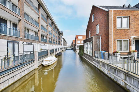 Beautiful view of a residential area by the riverの写真素材