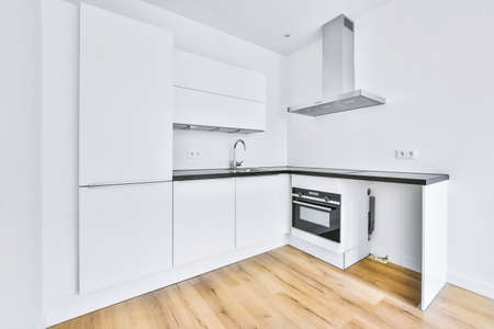 Interior of a beautiful kitchen in modern apartmentの写真素材