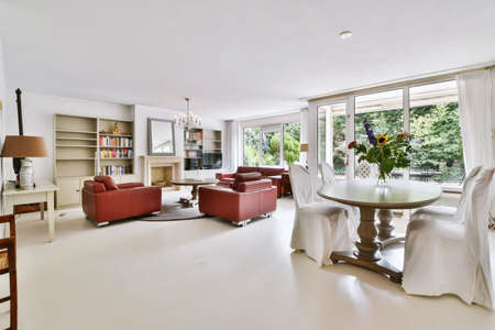 Bright room interior with red stylish sofaの写真素材