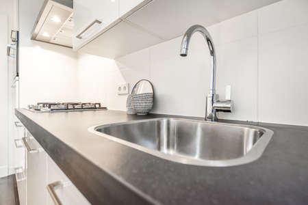 Close up of elegant sink in luxury kitchen