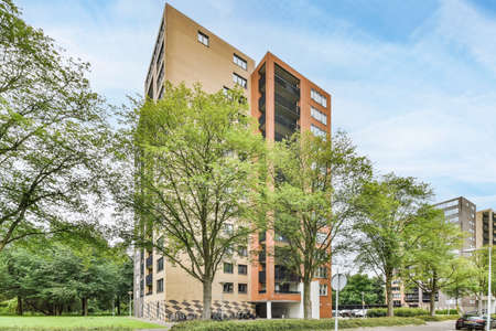 Beautiful view of stylish cozy high-rise building