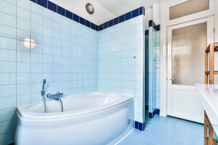 Luxury interior design of a bathroom with marble walls