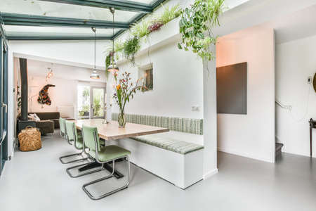 Bright dining room with decorative table and chairs