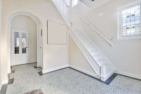 Room with stairs to the second floor
