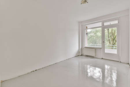 Interior design of bright clean room with windowの写真素材