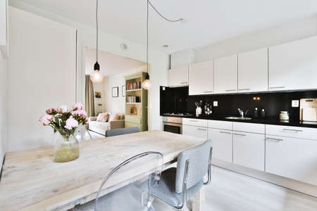 Stylish cozy kitchen island in luxury houseの写真素材