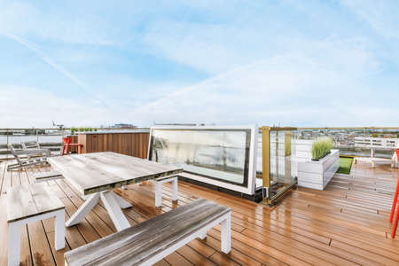 Cozy summer veranda on the roof of the house