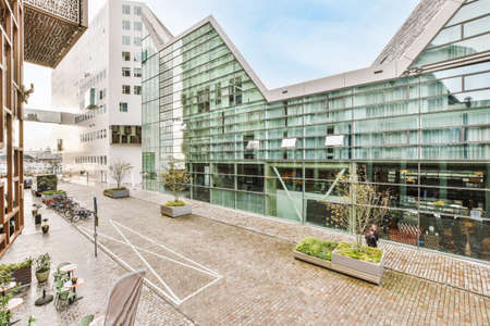Stylish architectural multi-storey buildings with bicycle parking spaces
