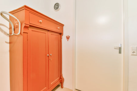 Corner of an elegant room with a chest of drawers