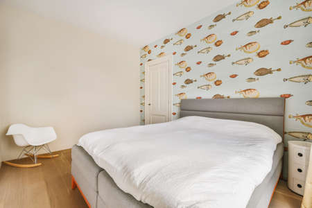 Modern bed with comfortable mattress and soft pillows