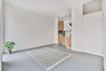 Light room with a small kitchen areaの写真素材