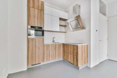 Light room with a small kitchen areaの写真素材