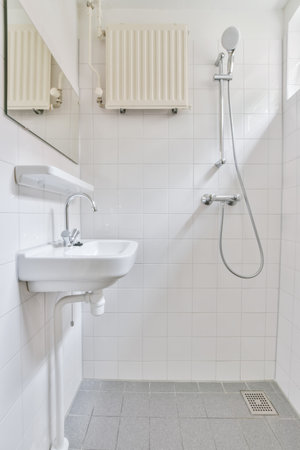 White bathroom in an elegant residential buildingの写真素材