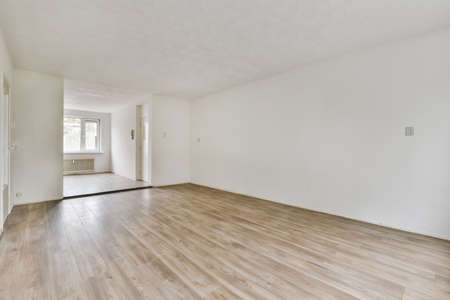A breathtaking daylight room with parquet flooringの写真素材