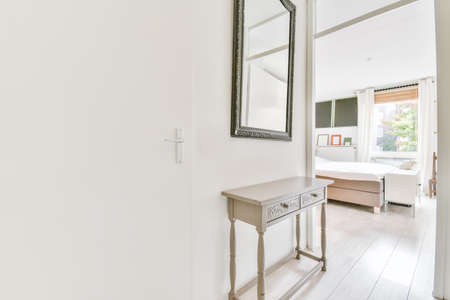 Interior of contemporary flat in minimal style with spacious hallway with white wallsの写真素材