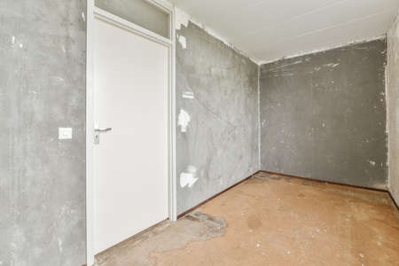Modern room with wooden floor and white wallsの写真素材