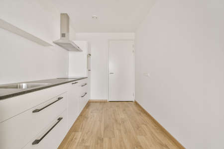 Interior of empty home kitchen with contemporary appliancesの写真素材