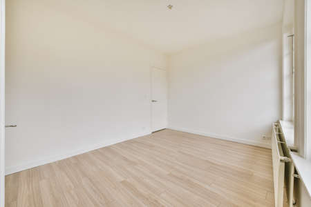 A cozy and spacious room in a modern houseの写真素材
