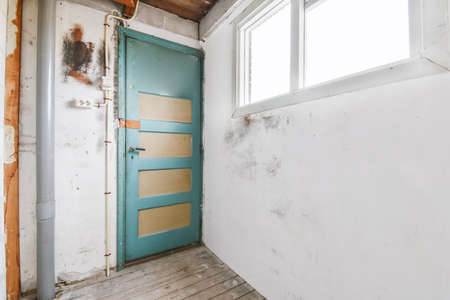 Unrepaired room in stylish and cozy houseの写真素材