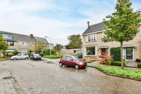 View of the facade of a two-story brick houseの写真素材