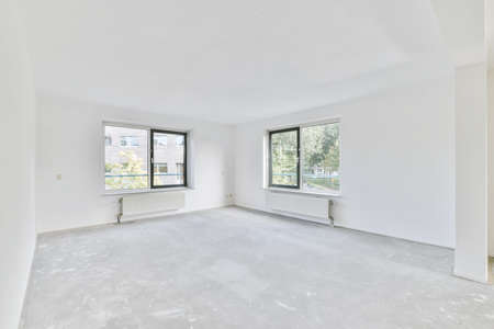 Large luxury room with sliding windows in an elegant apartmentの写真素材