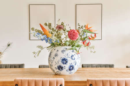 Decor in the form of a vase of flowers above the dining tableの写真素材