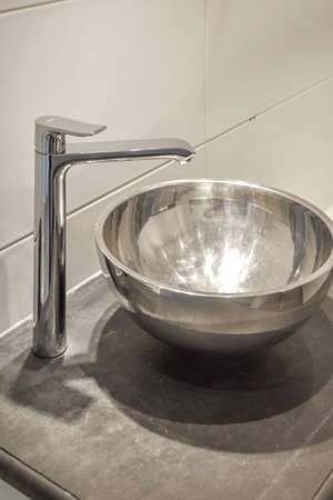 Close up of luxury faucet in an elegant bathroomの写真素材