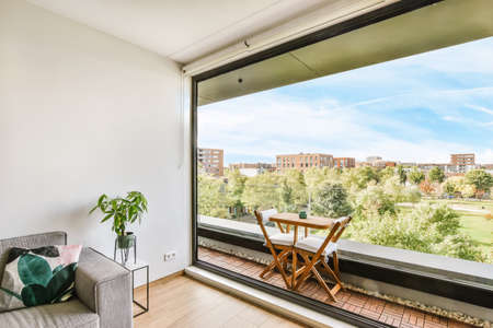 Stunning balcony with wooden table and chairs and mesmerizing views