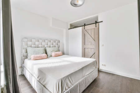 Nice and cozy bedroom design in white tones