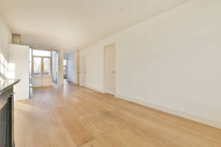 Interior of new apartment, empty living room, wooden floor