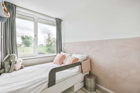 Interior of childs room with white walls