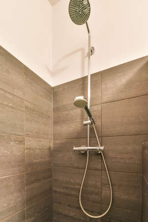 Modern shower stall in a bright bathroom