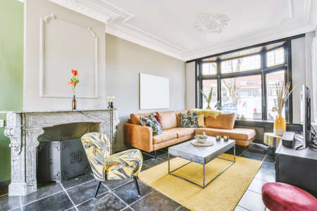 Amazingly decorated living room with brown sofa and beautiful coffee table