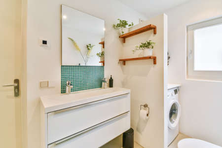 Interior of small clean bathroom in miniature styleの写真素材