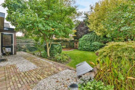 Delightful courtyard with many trees and bushes