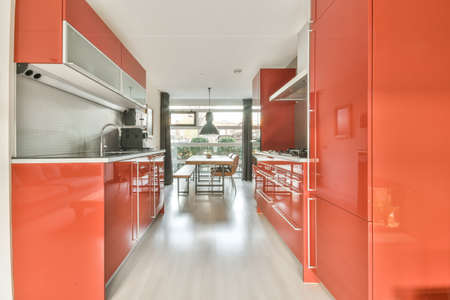 Cozy kitchen zone with in a spacious apartmentの写真素材