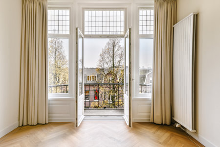 Amazing design of a room with doors and parquet floors in a luxury houseの写真素材
