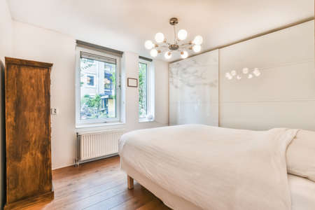 Beautiful bedroom in new luxury home with some decor