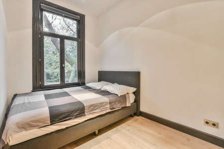 Interior of a cozy and bright bedroom with beautiful decoration